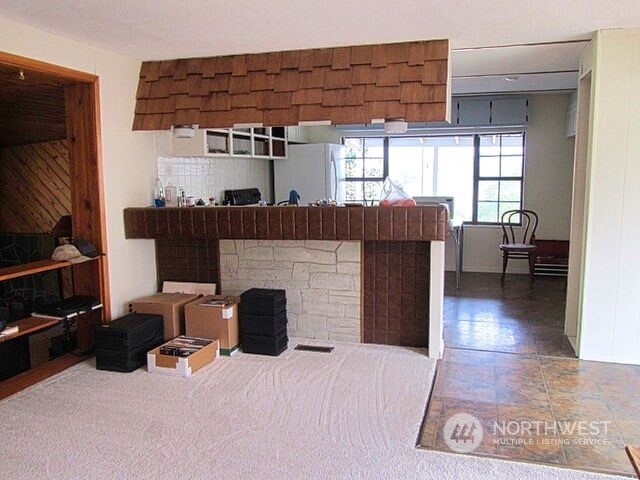 309 North Main Street Riverside, WA 98849 - Photo 4 of 31 a view of a livingroom with furniture and a fireplace