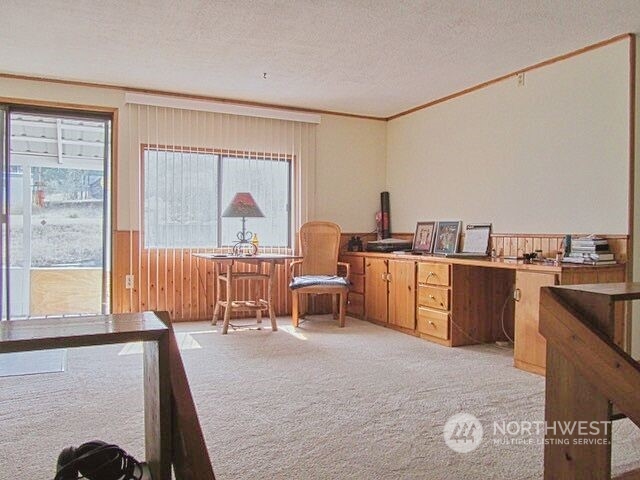 309 North Main Street Riverside, WA 98849 - Photo 5 of 31 a room with a bed and a large window
