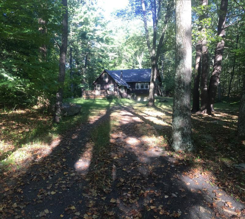 90 Chittenden Road Killingworth, CT 06419 - Photo 1 of 1 a backyard of a house with table and chairs
