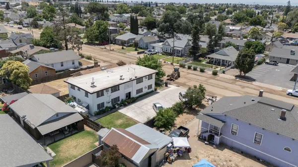 an aerial view of a house with a garden