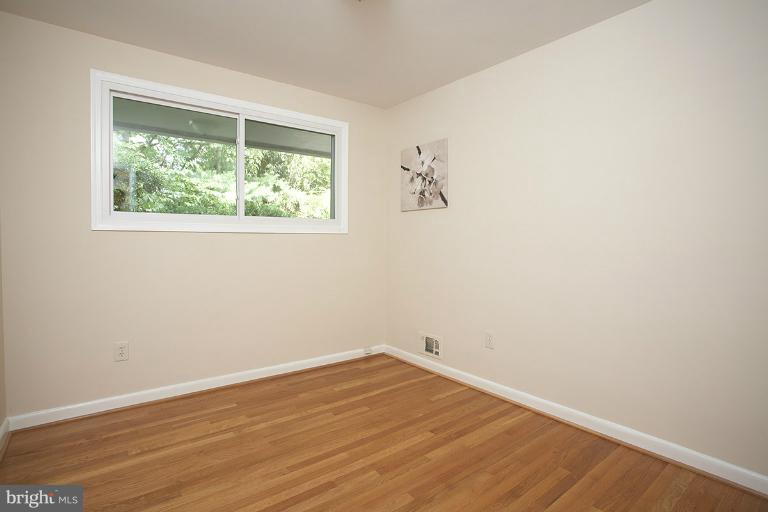 11204 Monticello Avenue Silver Spring, MD 20902 - Photo 15 of 29 an empty room with a window