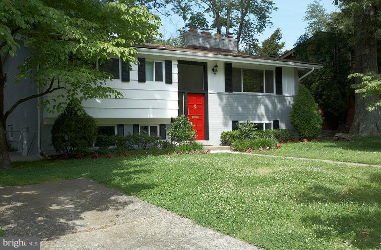 11204 Monticello Avenue Silver Spring, MD 20902 - Photo 29 of 29 a view of house with a yard and potted plants