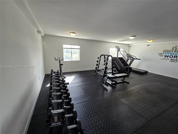 a view of a room with gym equipment