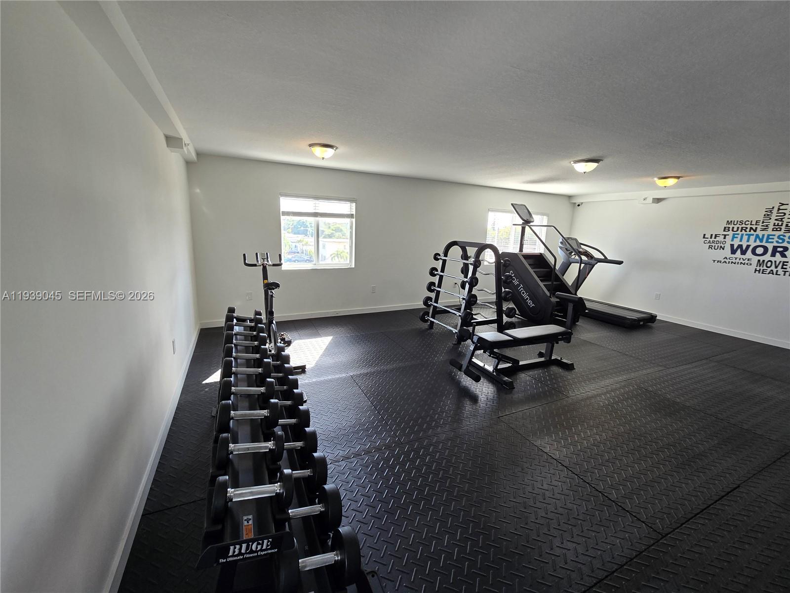 5185 West Flagler Street, Unit 204 Miami, FL 33134 - Photo 18 of 20 a view of a room with gym equipment