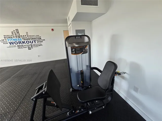 a view of workspace with furniture and windows