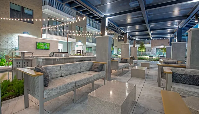 a view of a couches and a tables in the patio