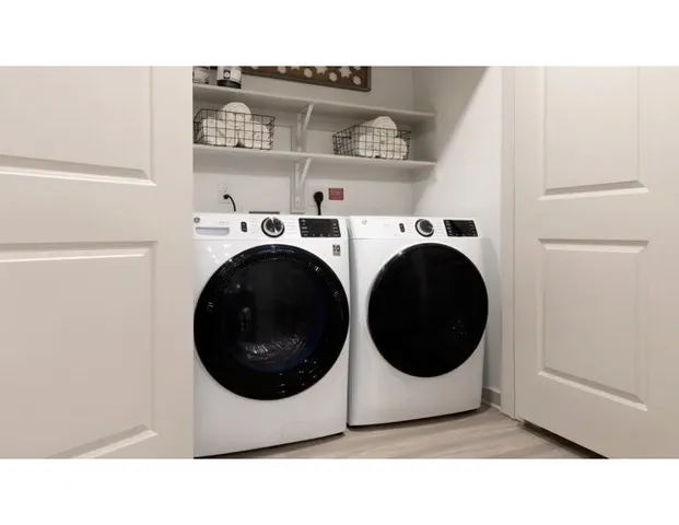 a black and white photo of a living room