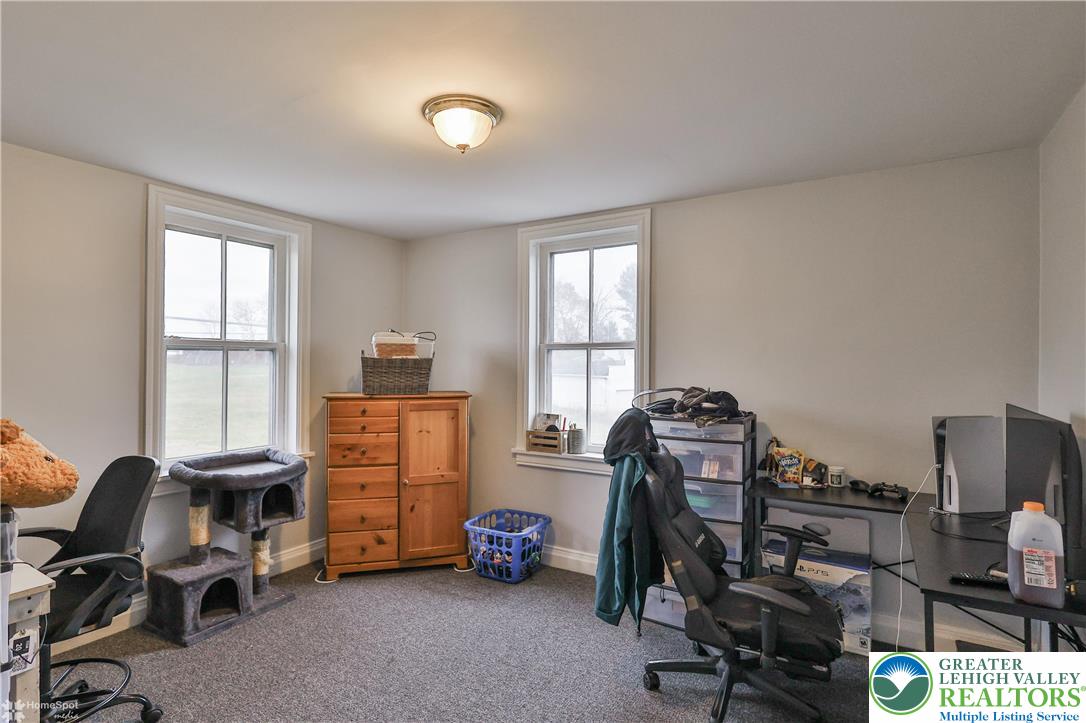 4448 Orefield Road Orefield, PA 18069 - Photo 11 of 20 a view of a workspace with furniture and a window