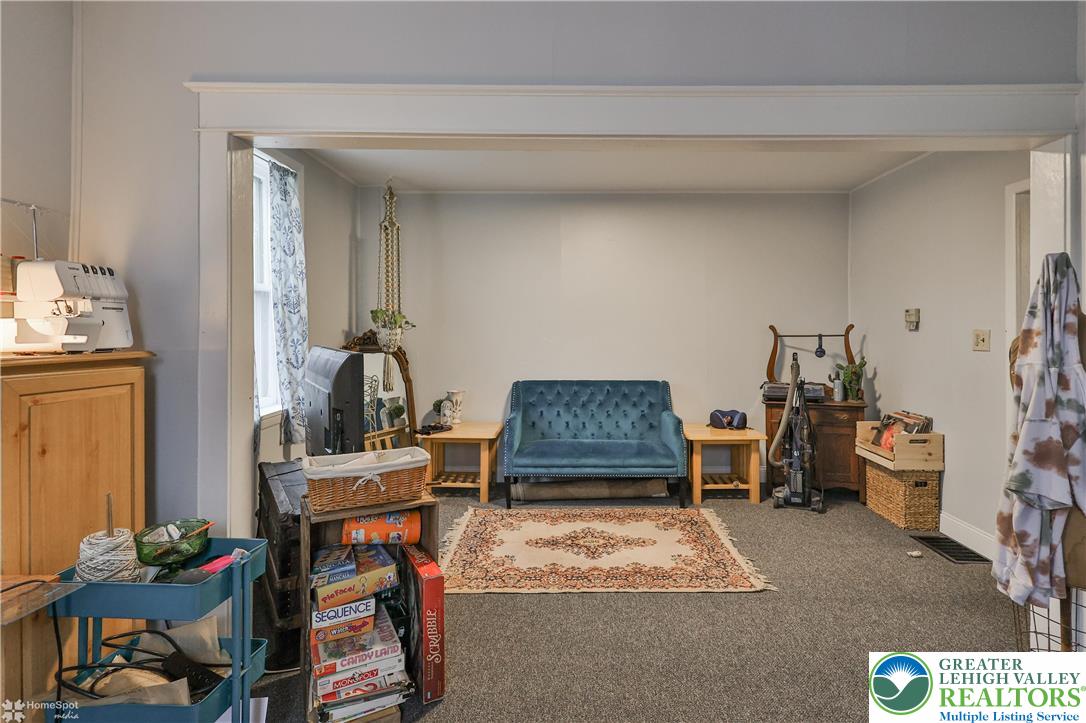 4448 Orefield Road Orefield, PA 18069 - Photo 12 of 20 a living room with furniture and a couch