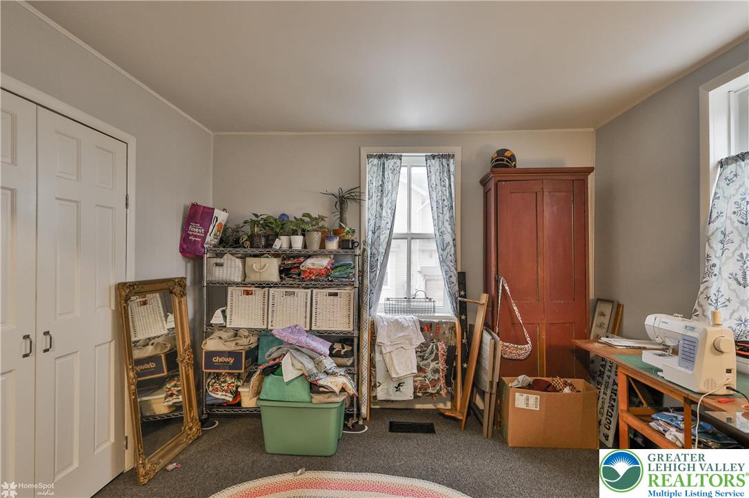 4448 Orefield Road Orefield, PA 18069 - Photo 13 of 20 a room with gym equipment and a window