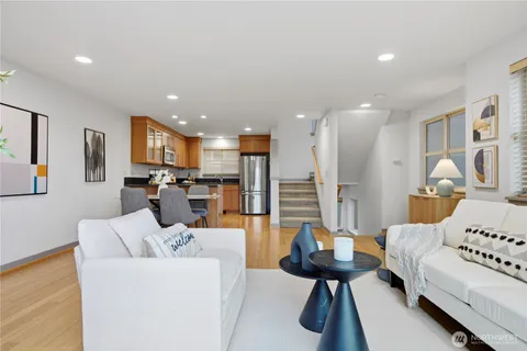 a living room with furniture and a table