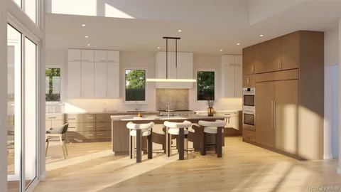 a kitchen with stainless steel appliances kitchen island granite countertop a refrigerator and a stove