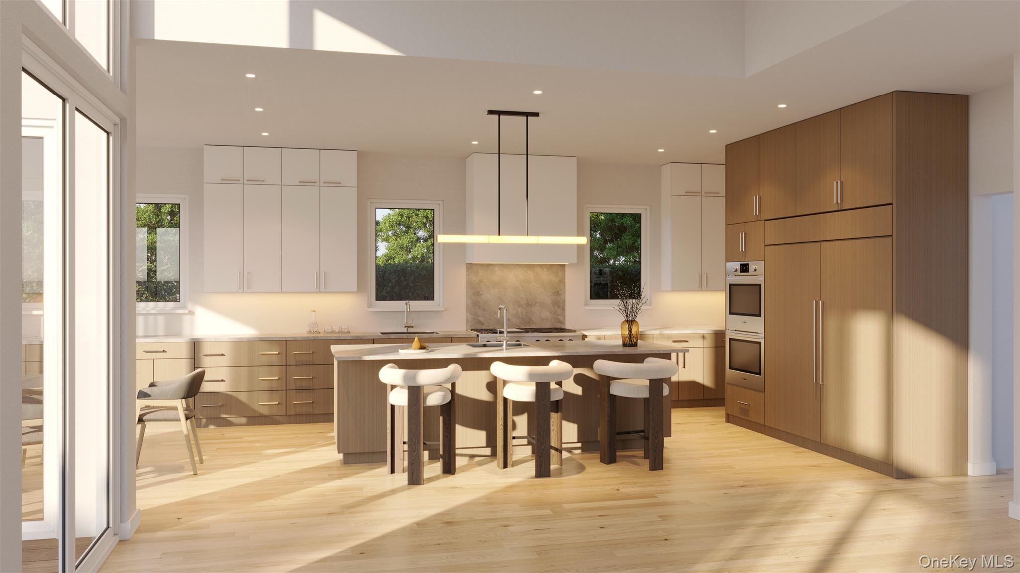 20 Cambridge Road Scarsdale, NY 10583 - Photo 3 of 6 a kitchen with stainless steel appliances kitchen island granite countertop a refrigerator and a stove