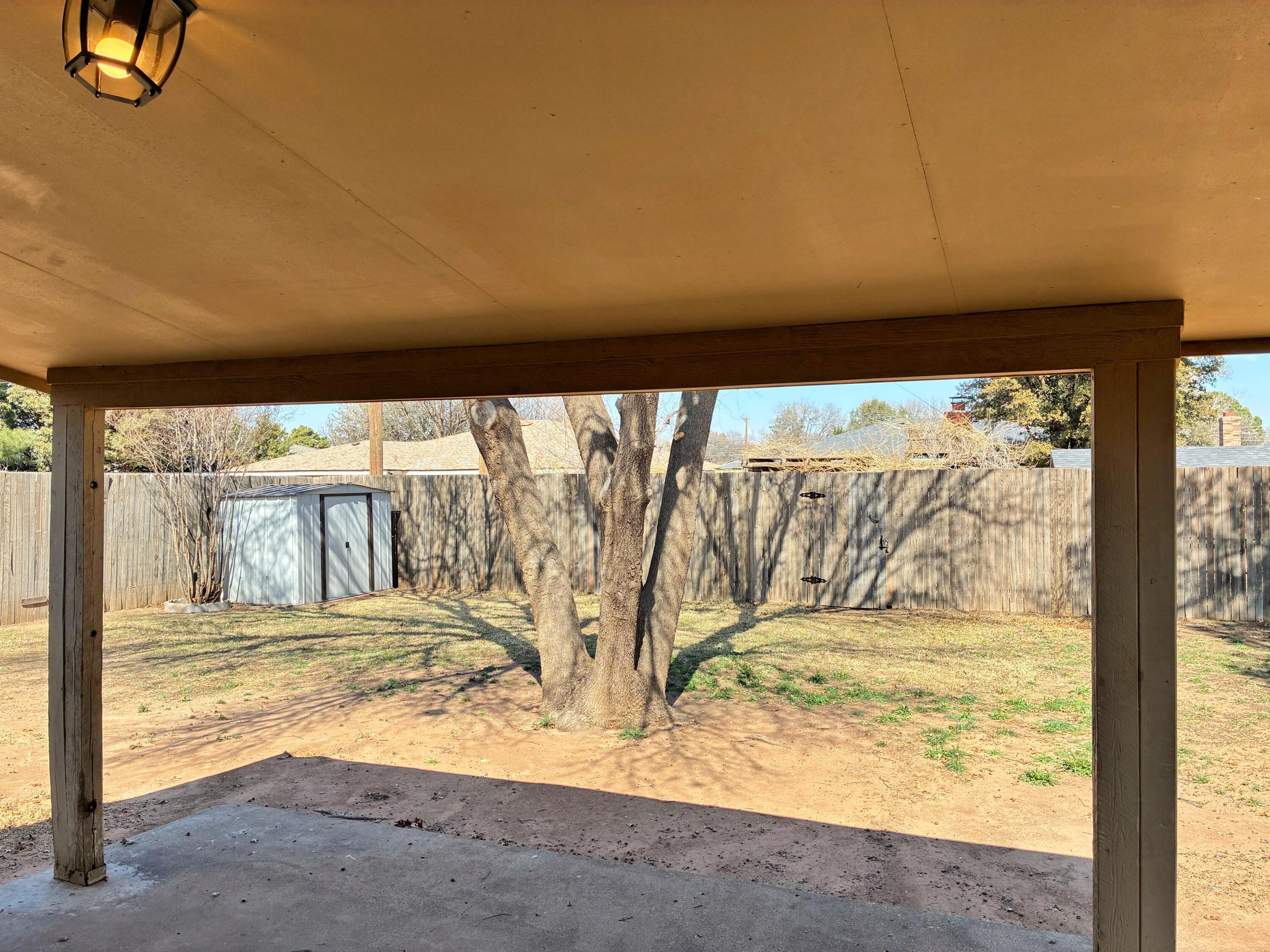 4904 64th Street Lubbock, TX 79414 - Photo 40 of 47 Large Backyard with Covered Porch