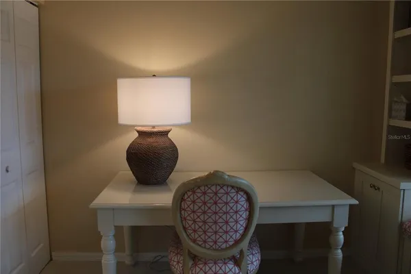 a view of a workspace with furniture