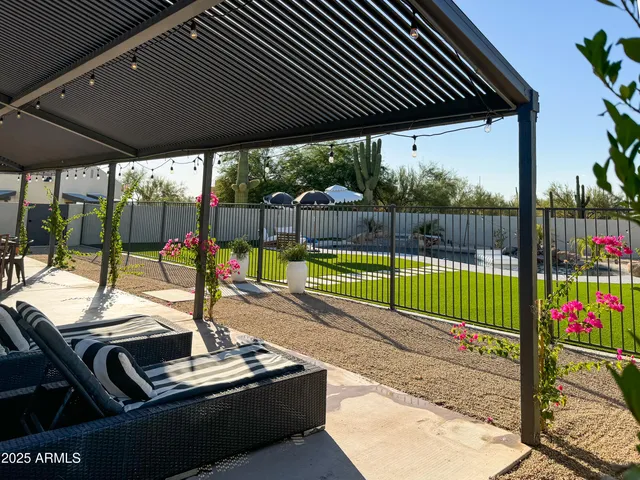 a view of a swimming pool with a porch