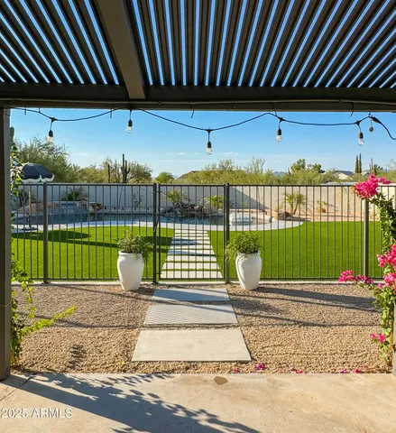a view of a swimming pool with a patio