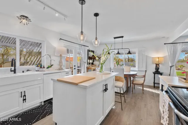 a view of a kitchen and dining room