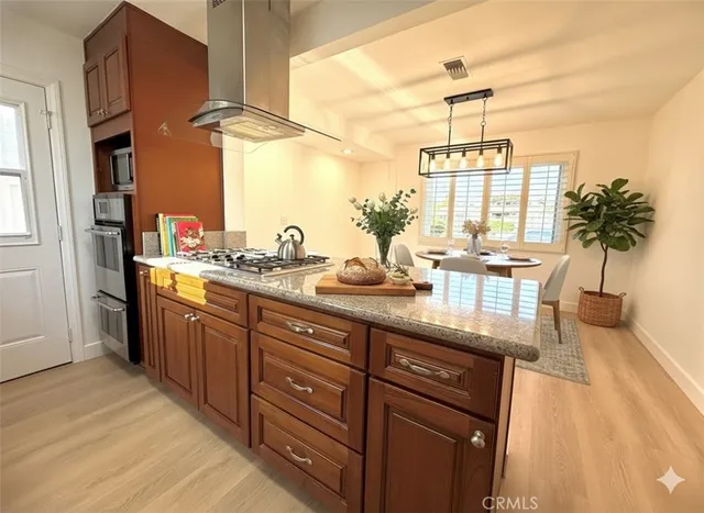 a kitchen with sink cabinets and window