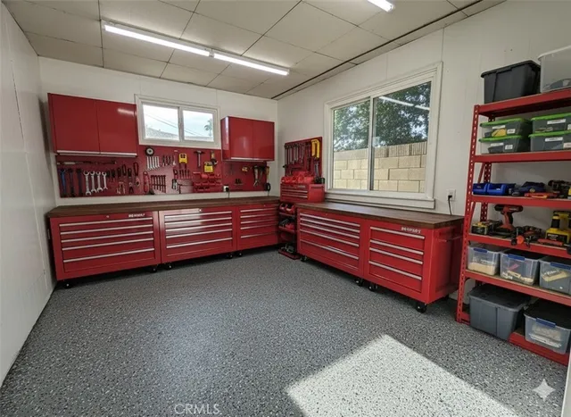 a view of room with stairs and a window