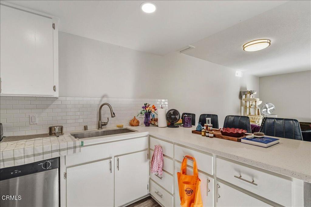 3380 Bullock Lane San Luis Obispo, CA 93401 - Photo 3 of 14 a kitchen with a sink and cabinets