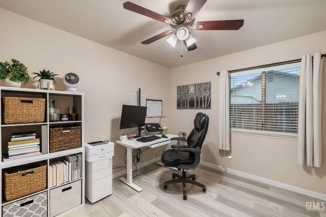 a view of a house with swimming pool and a yard