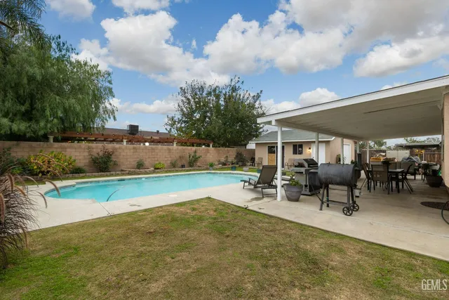 a view of a house with swimming pool