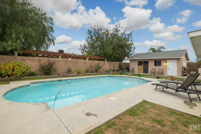 an aerial view of a house with a garden