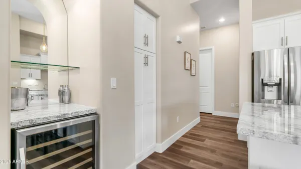 a bathroom with a granite countertop sink