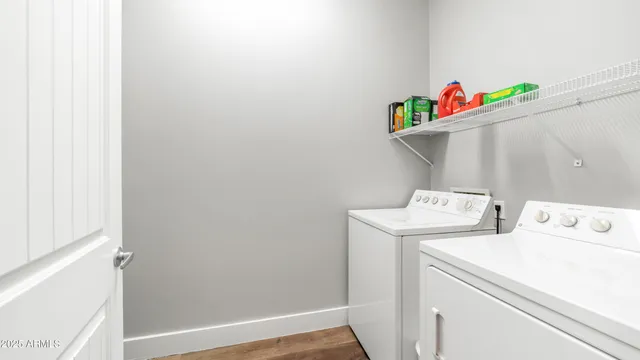 a utility room with dryer and washer