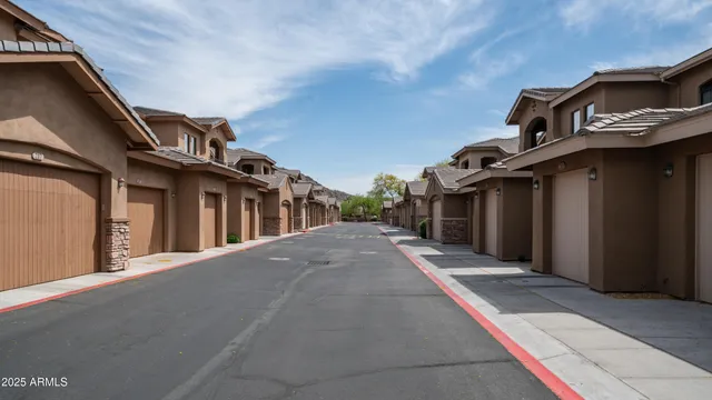 a view of a house with a street