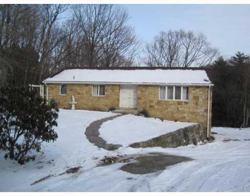 Exterior Front. This inviting home is not in a plan.  All stone.  One year buyer home warranty included.