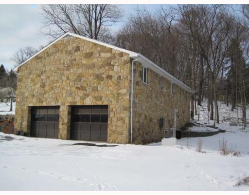 124.5 Miller Road Pittsburgh, PA 15237 - Photo 2 of 14 View. Right side showing 2-car intergral garage