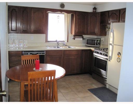 124.5 Miller Road Pittsburgh, PA 15237 - Photo 10 of 14 Kitchen. Spacious eat-in kitchen with lots of cabinets, tiled floor and ample counter space.