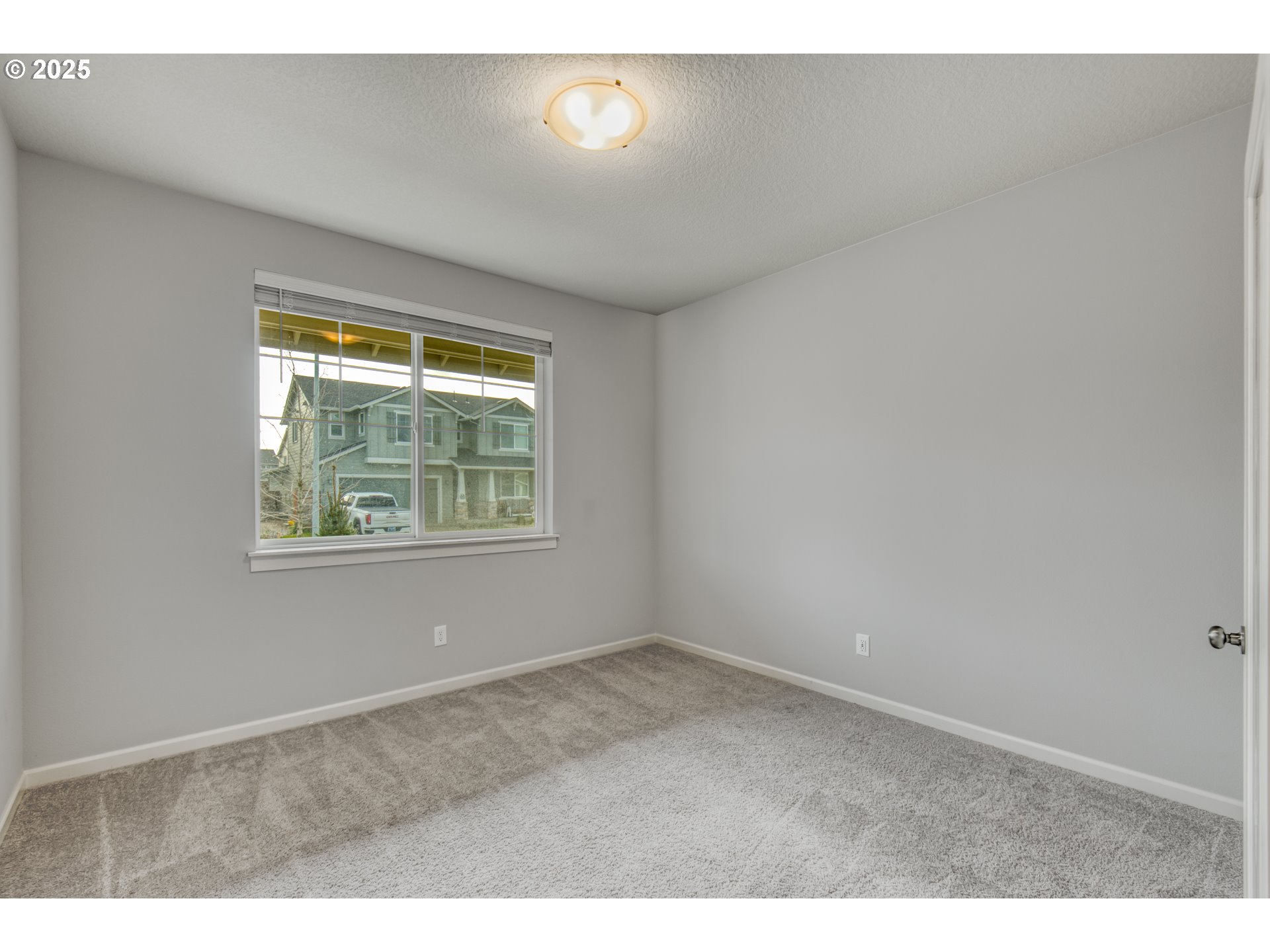 6443 Southeast 22nd Street Gresham, OR 97080 - Photo 16 of 27 an empty room with windows