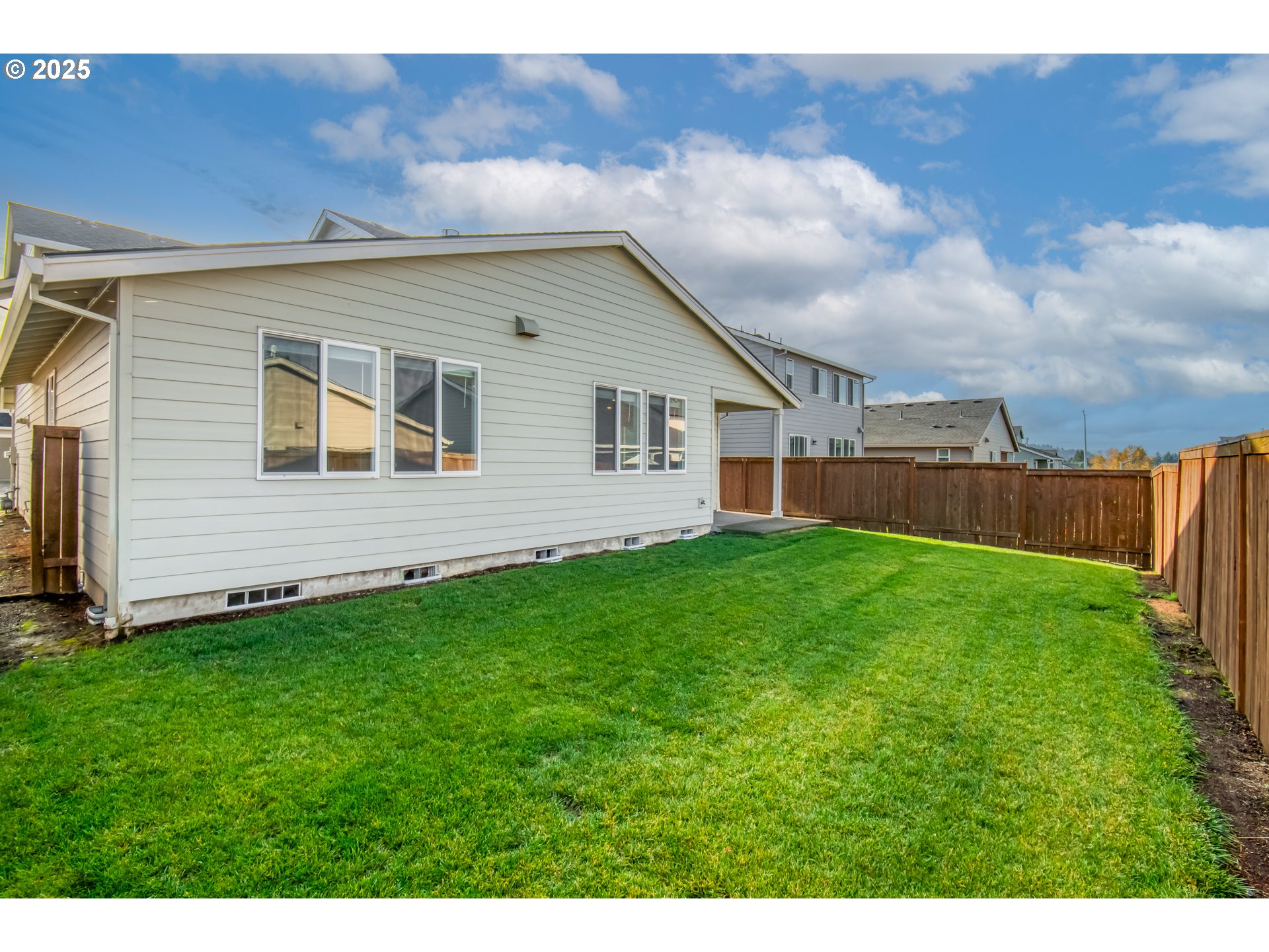 6443 Southeast 22nd Street Gresham, OR 97080 - Photo 25 of 27 a backyard of a house with lots of green space