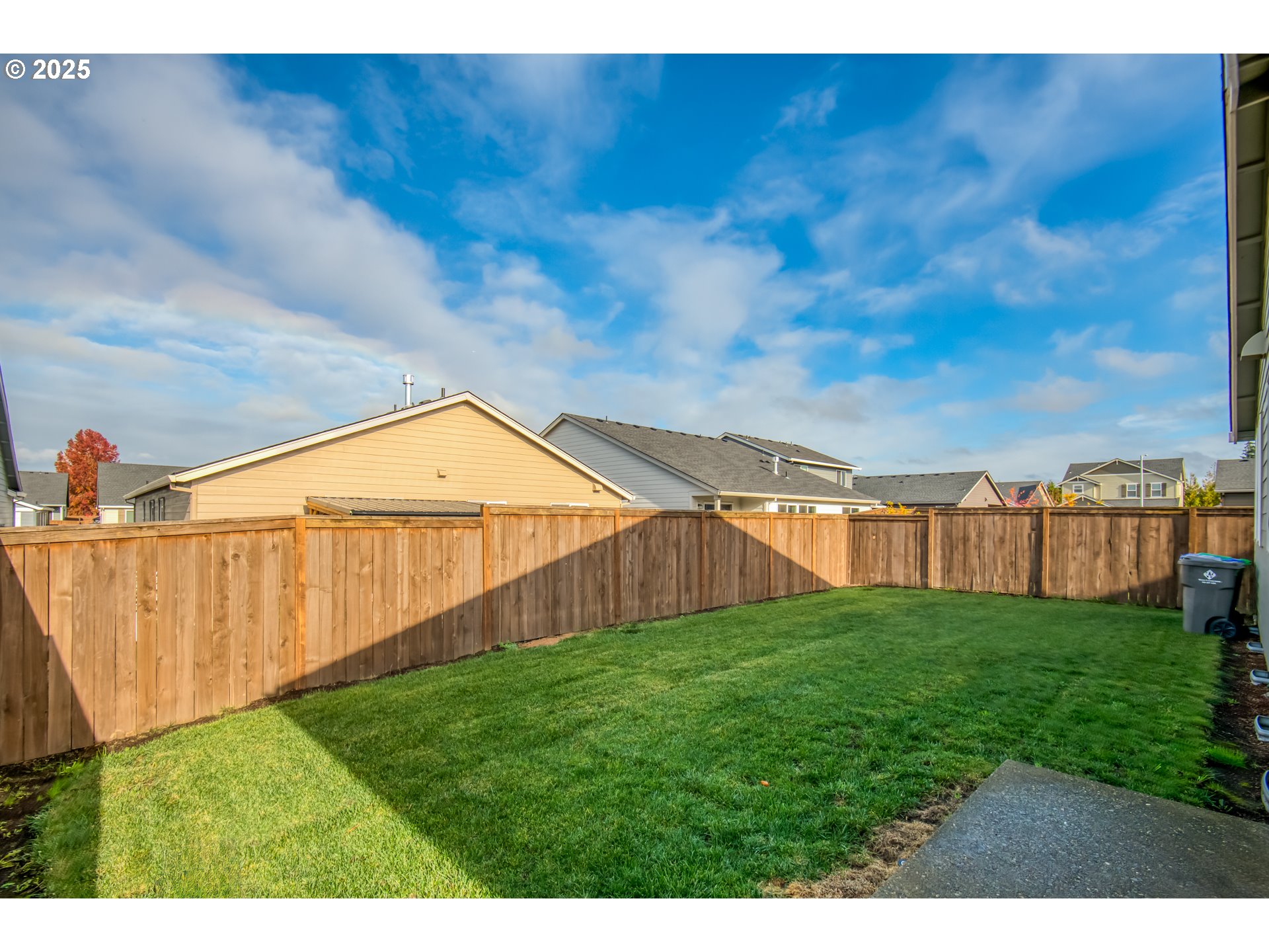 6443 Southeast 22nd Street Gresham, OR 97080 - Photo 27 of 27 a view of yard with swimming pool and wooden fence