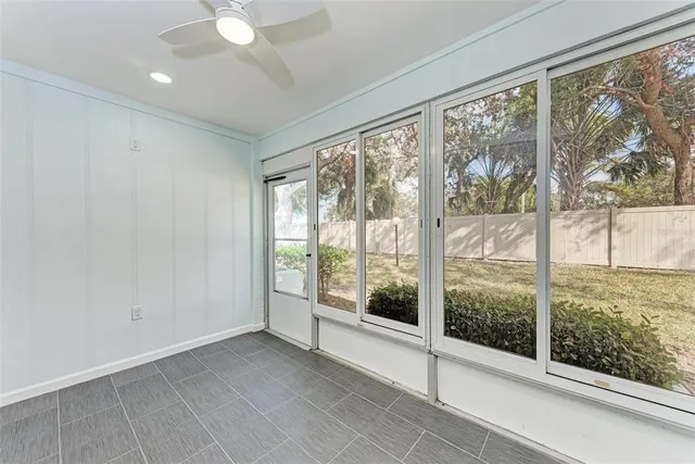 a view of a room with a large window