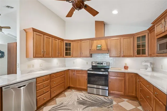 a bathroom with a double vanity sink mirror and bathtub