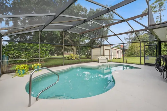 a view of a garden with an outdoor space
