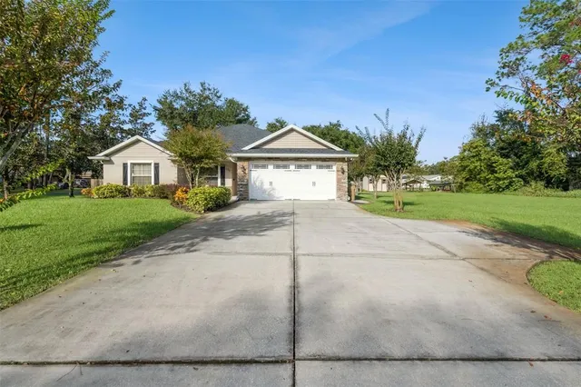 a view of a garden with houses