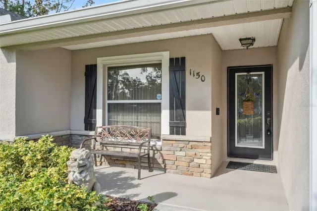 a large room with closet and mirror