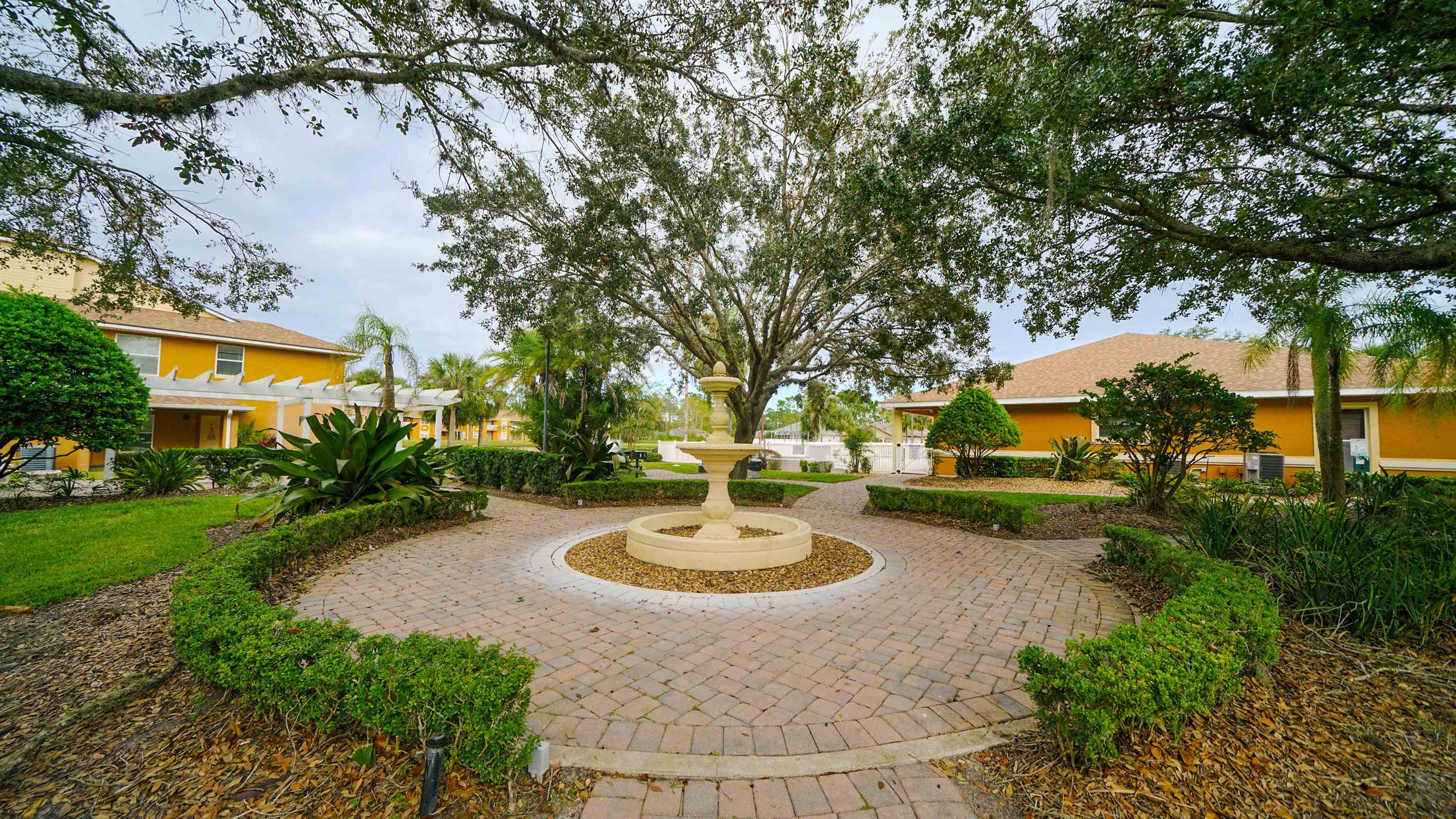 4600 East Moody Boulevard, Unit 8P Bunnell, FL 32110 - Photo 22 of 32 a swimming pool with outdoor seating and yard
