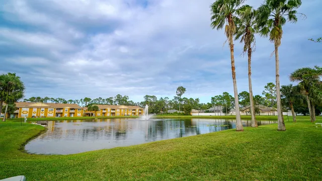 a view of a lake with a big yard
