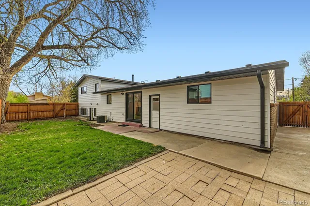 a view of a backyard with a garden