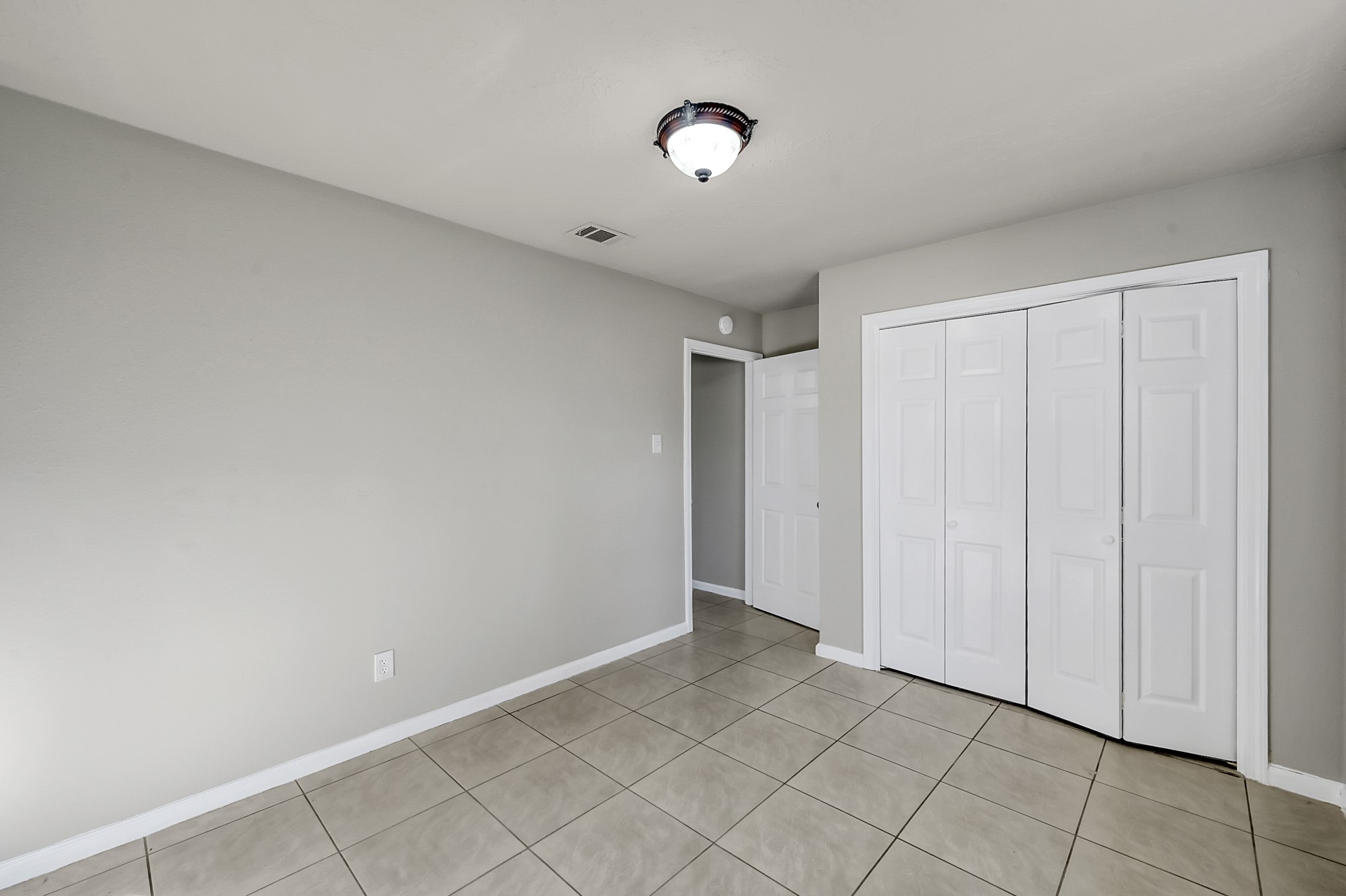 4310 Enchantedgate Drive Spring, TX 77373 - Photo 22 of 39 This bedroom features a good sized closet.