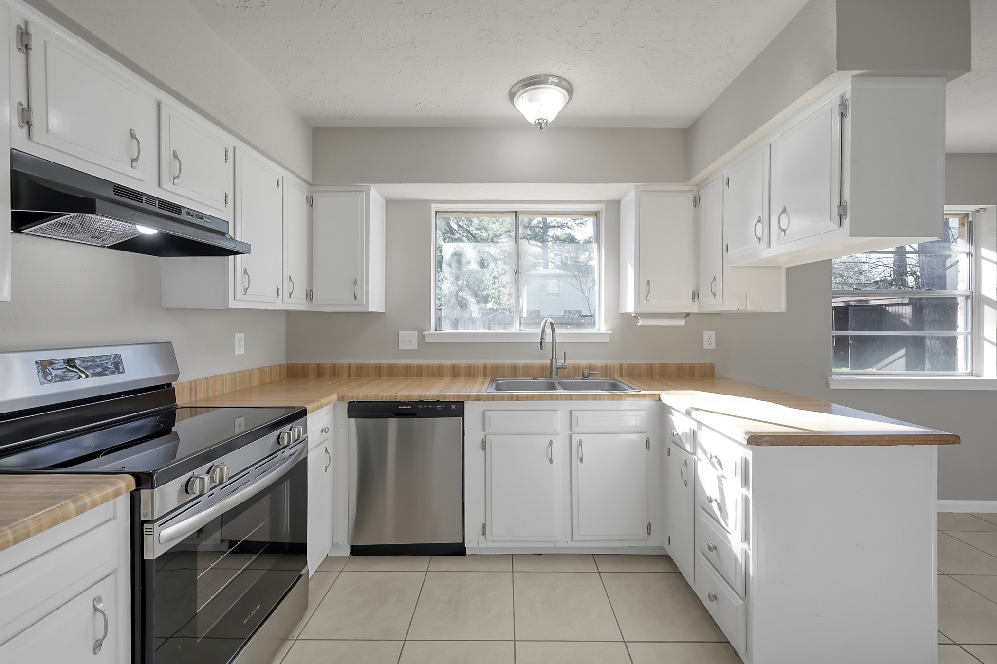 4310 Enchantedgate Drive Spring, TX 77373 - Photo 7 of 39 Plenty of cabinets & counter space.