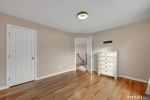 a bathroom with 2 sink and a toilet