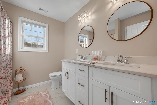 front view of a house with a dry yard