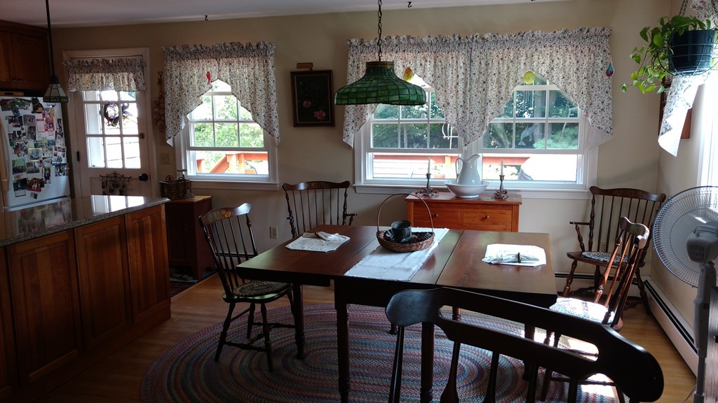 841 Dennison Drive Southbridge, MA 01550 - Photo 12 of 28 a view of a dining room with furniture window and outside view